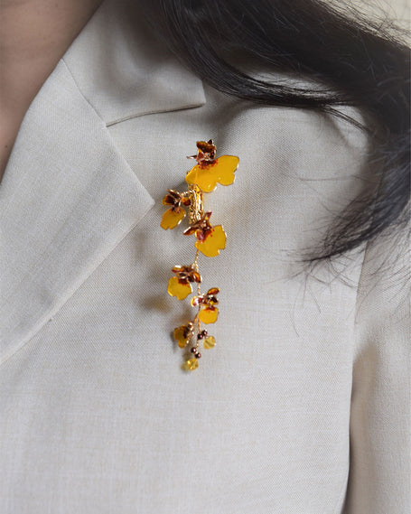 This is a handmade Orchid branch brooch or Men's Boutonniere in gold finish and red yellow colour flowers.