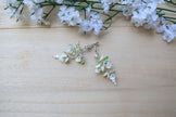An elegant dangle flower earrings white Bougainvillea, tiny 7MM flowers leaves, white and pastel green, Silver finish