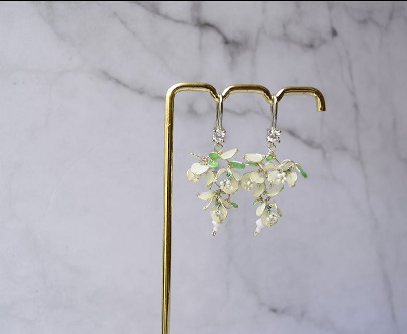 An elegant dangle flower earrings white Bougainvillea, tiny 7MM flowers leaves cluster, white and pastel green, Silver finish