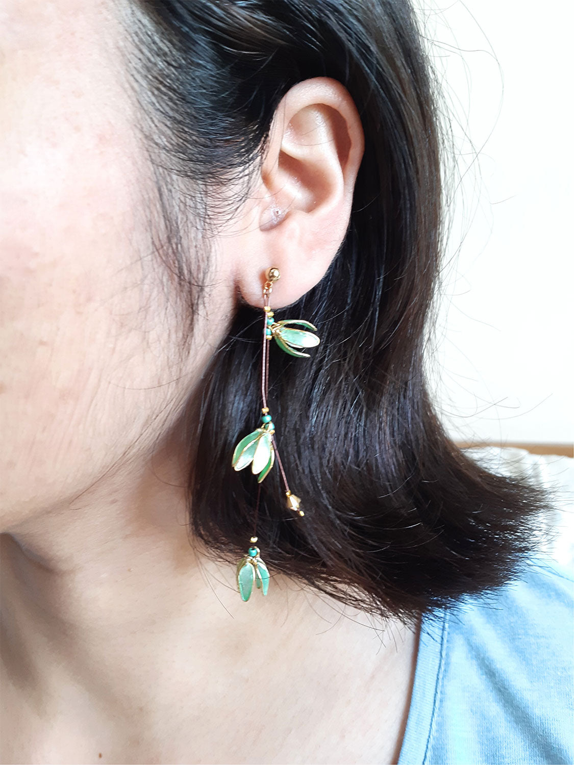 Pastel green 3 tiny flowers dangle on a tiger tail thread, handmade long earring, cute and delicate