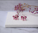 A hand formed and hand-painted Purple-White Orchid flower stud earrings.