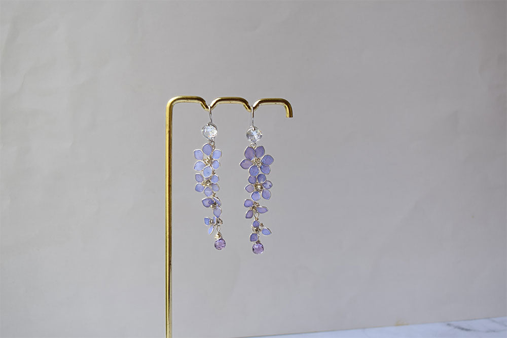 A delicate, elegant long silver finish earrings with tiny cascading Lavender/purple flowers with dangling Zircon teardrop, handmade artisan earrings.