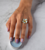 Forget-Me-Not finger ring with slider chain