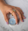 Forget-Me-Not finger ring with slider chain