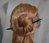 A black finish wooden hair stick with tiny Forget-Me-Not sky blue flowers hair stick for buns.