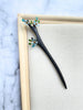 A black finish wooden hair stick with tiny Forget-Me-Not sky blue flowers hair stick for buns.
