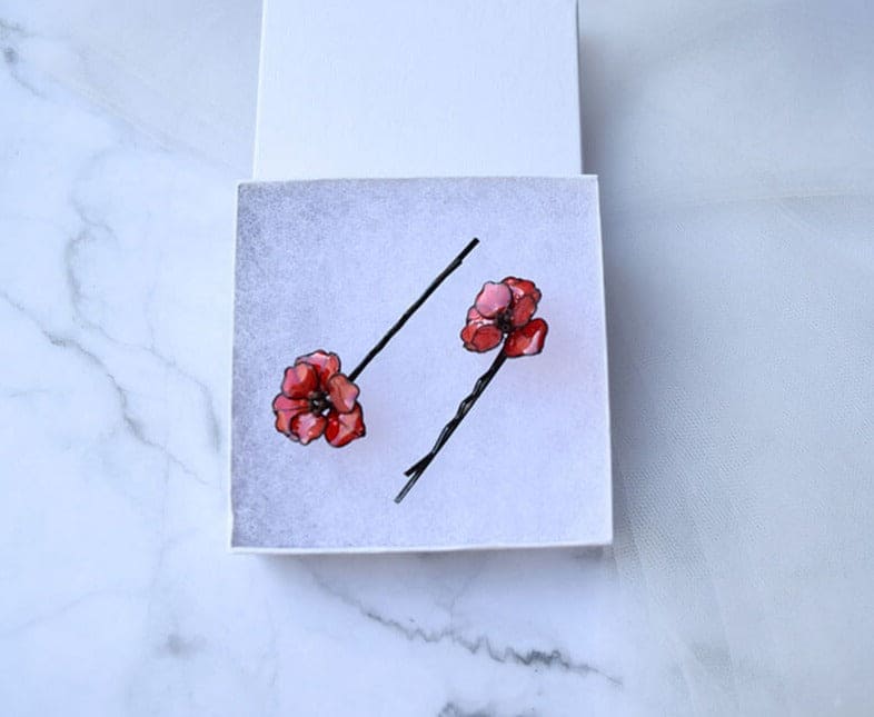 A hand formed Black wire Poppy flowers Hair pins and Hair forks.